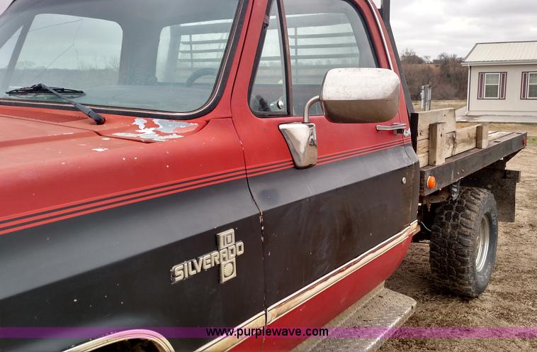 image for item L7318 1984 Chevrolet Silverado C10 flatbed pickup truck