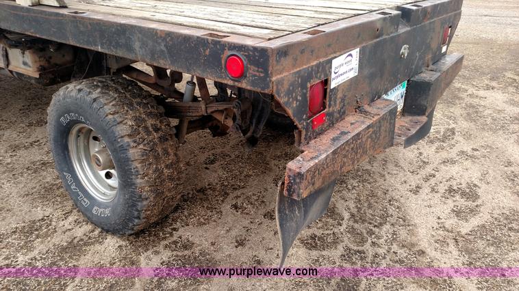 image for item L7318 1984 Chevrolet Silverado C10 flatbed pickup truck