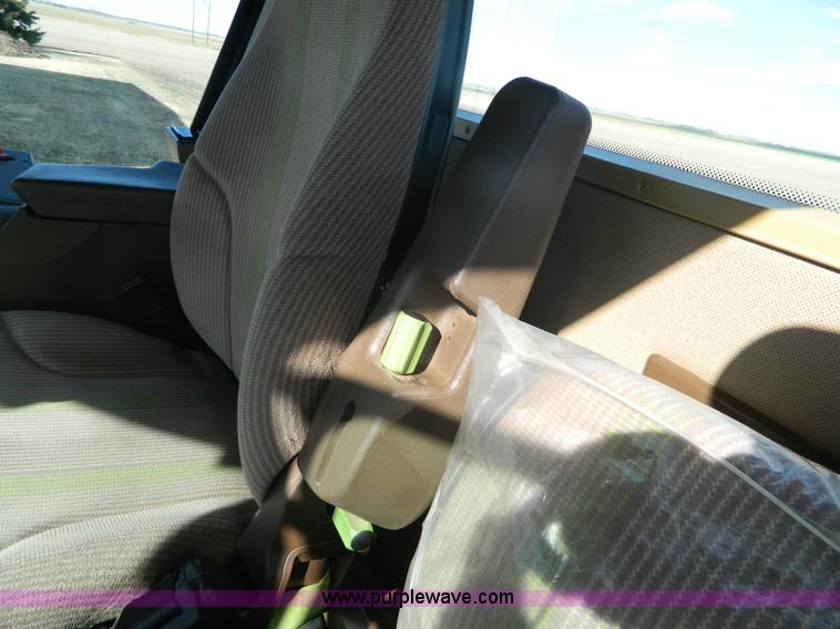 image for item L7346 2003 John Deere 4895 self-propelled windrower