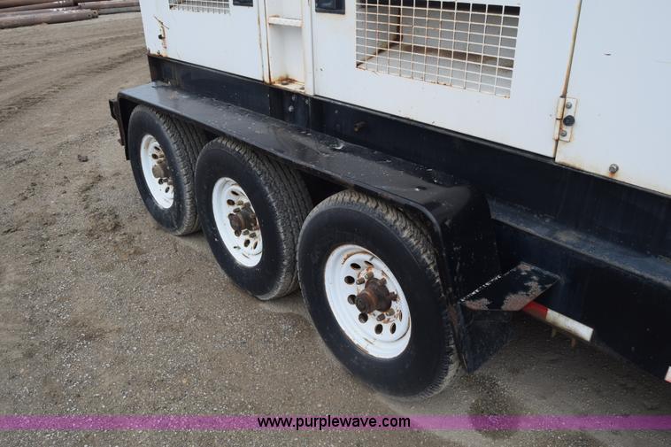 image for item BX9887 Multiquip Whisperwatt AC generator