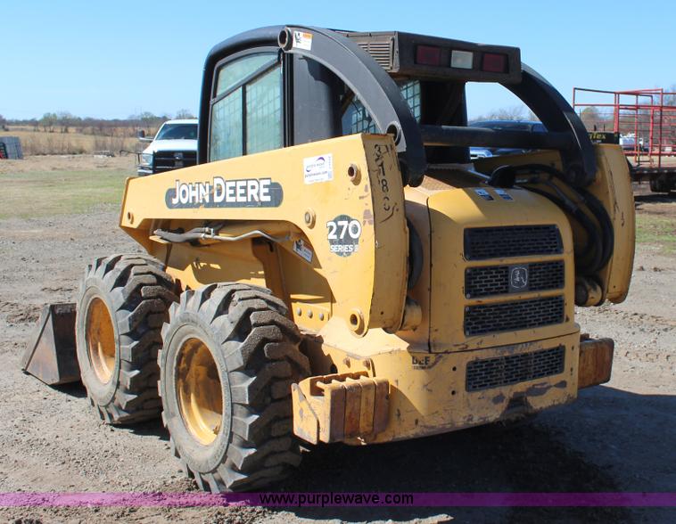image for item J7558 2003 John Deere 270 skid steer
