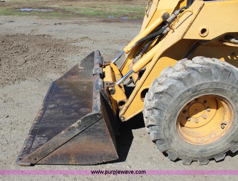 image for item J7558 2003 John Deere 270 skid steer
