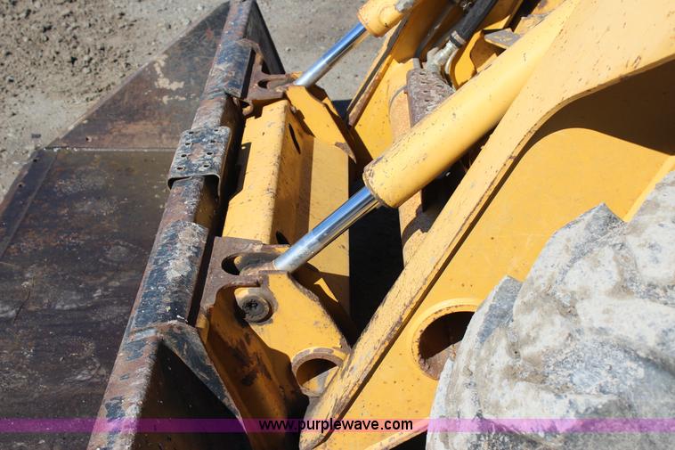 image for item J7558 2003 John Deere 270 skid steer