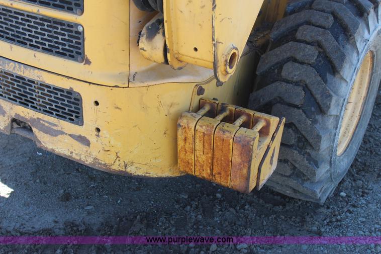 image for item J7558 2003 John Deere 270 skid steer