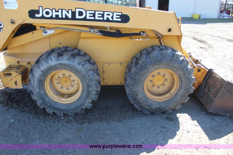 image for item J7558 2003 John Deere 270 skid steer
