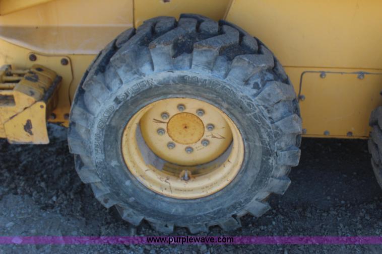 image for item J7558 2003 John Deere 270 skid steer