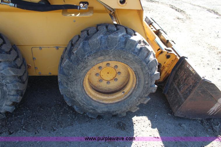 image for item J7558 2003 John Deere 270 skid steer