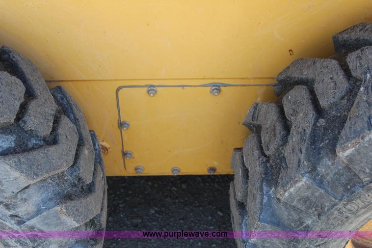 image for item J7558 2003 John Deere 270 skid steer