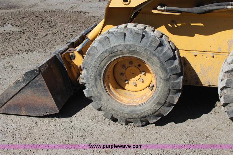 image for item J7558 2003 John Deere 270 skid steer