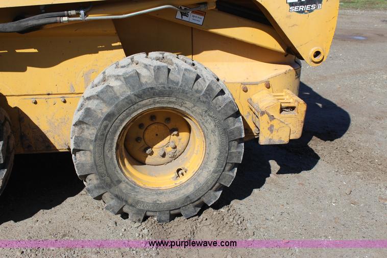 image for item J7558 2003 John Deere 270 skid steer