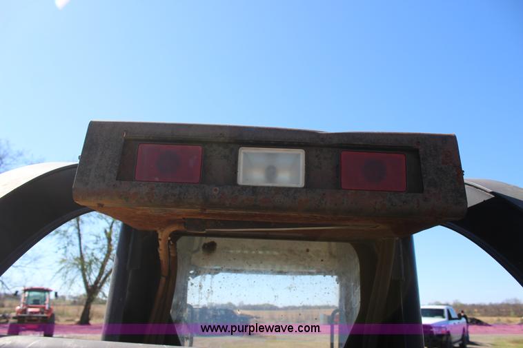 image for item J7558 2003 John Deere 270 skid steer