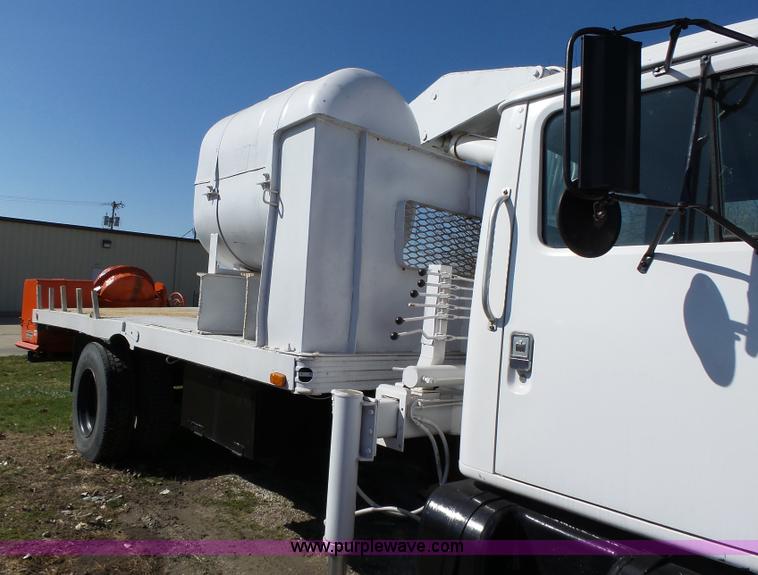 image for item L5613 1985 International S1954 flatbed truck with crane