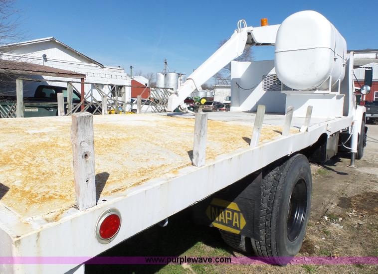 image for item L5613 1985 International S1954 flatbed truck with crane