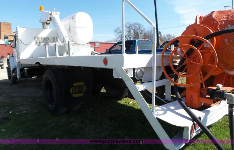 image for item L5613 1985 International S1954 flatbed truck with crane