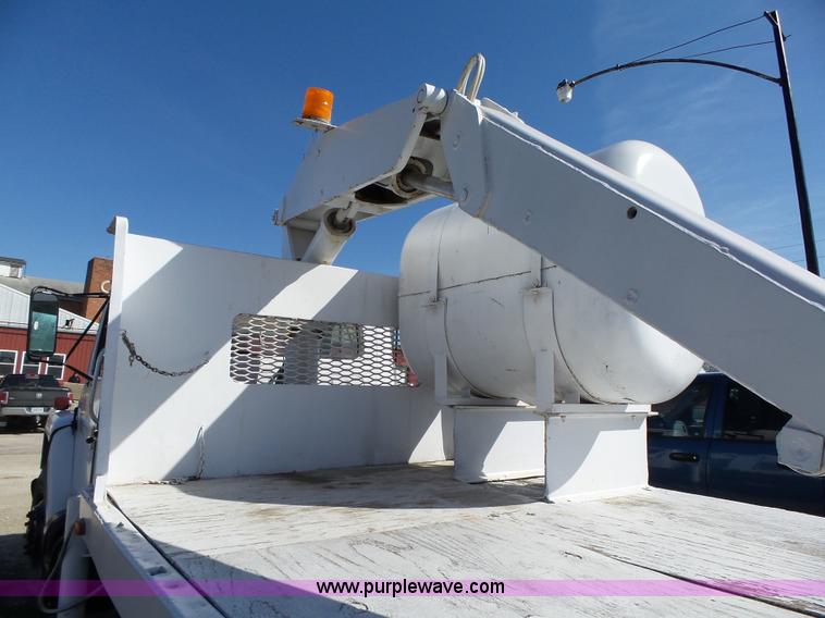 image for item L5613 1985 International S1954 flatbed truck with crane