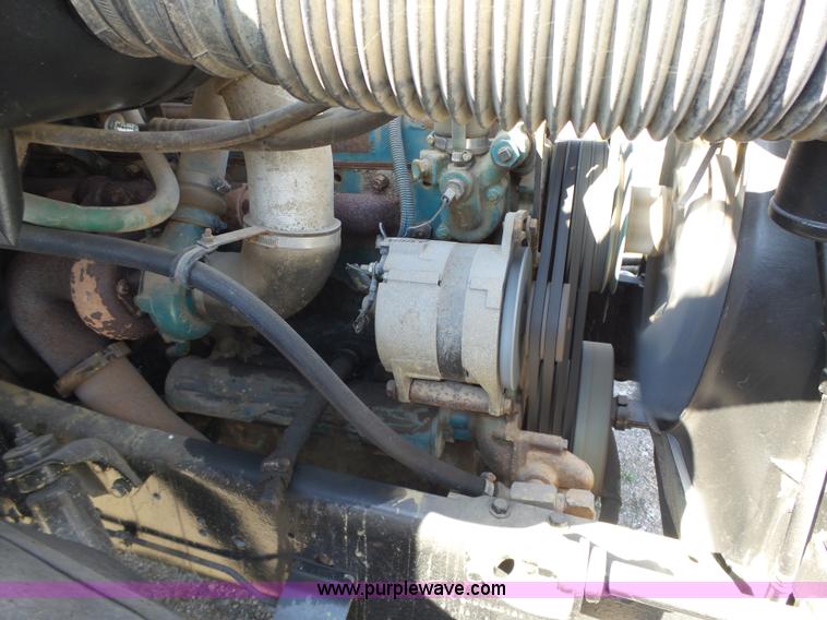 image for item L5613 1985 International S1954 flatbed truck with crane