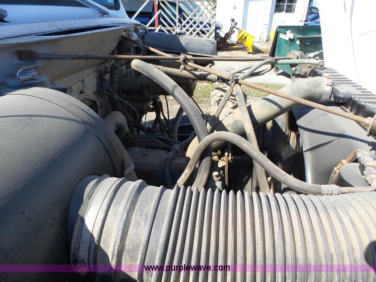 image for item L5613 1985 International S1954 flatbed truck with crane