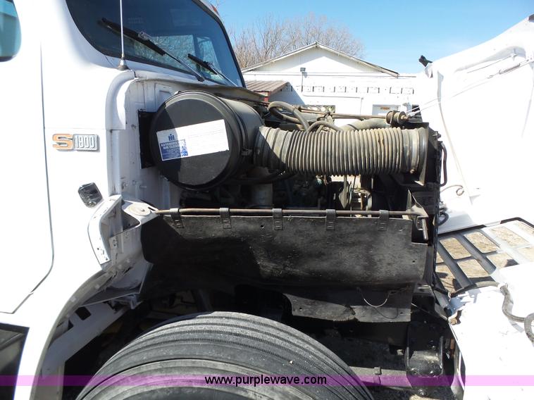 image for item L5613 1985 International S1954 flatbed truck with crane