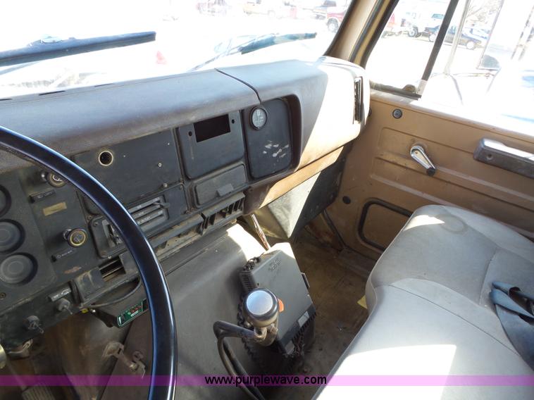 image for item L5613 1985 International S1954 flatbed truck with crane