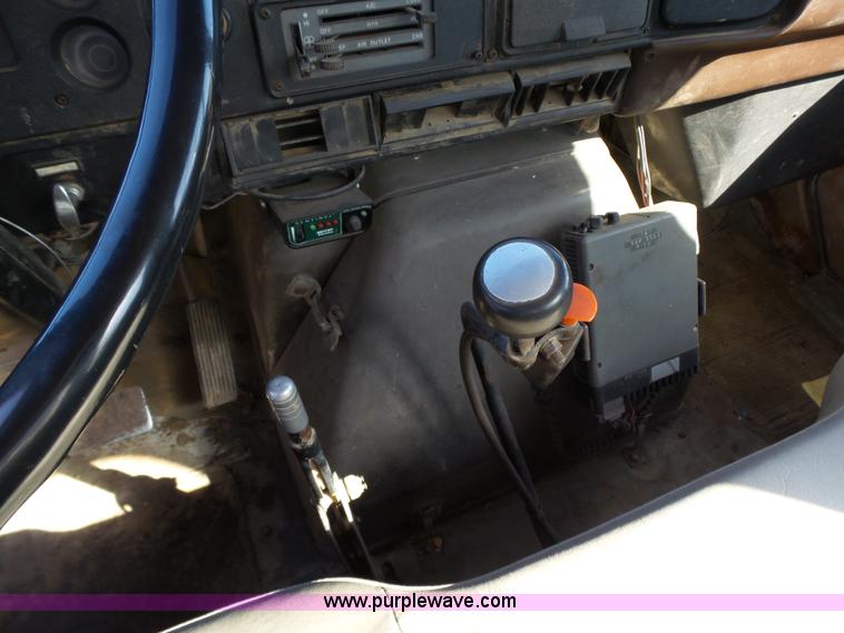 image for item L5613 1985 International S1954 flatbed truck with crane