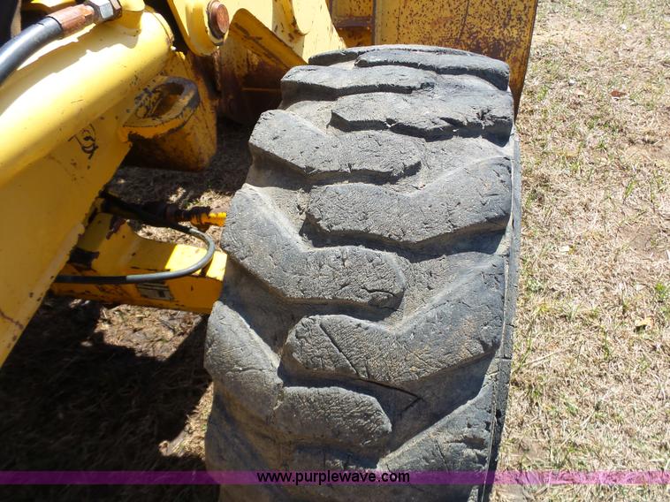 image for item L6280 1996 John Deere 310D backhoe