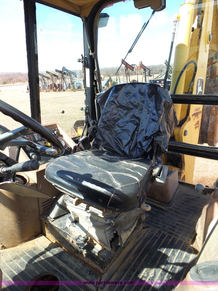 image for item L6280 1996 John Deere 310D backhoe