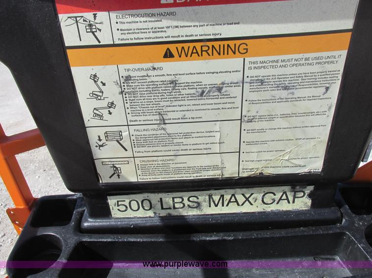 image for item L7151 2006 JLG E300AJP boom lift