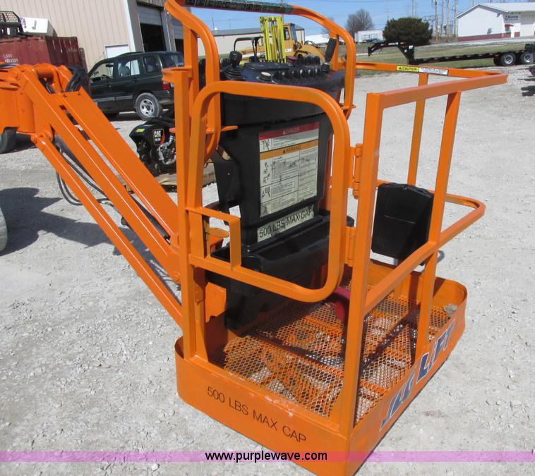 image for item L7151 2006 JLG E300AJP boom lift