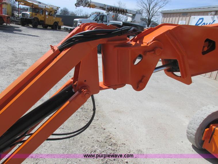 image for item L7151 2006 JLG E300AJP boom lift