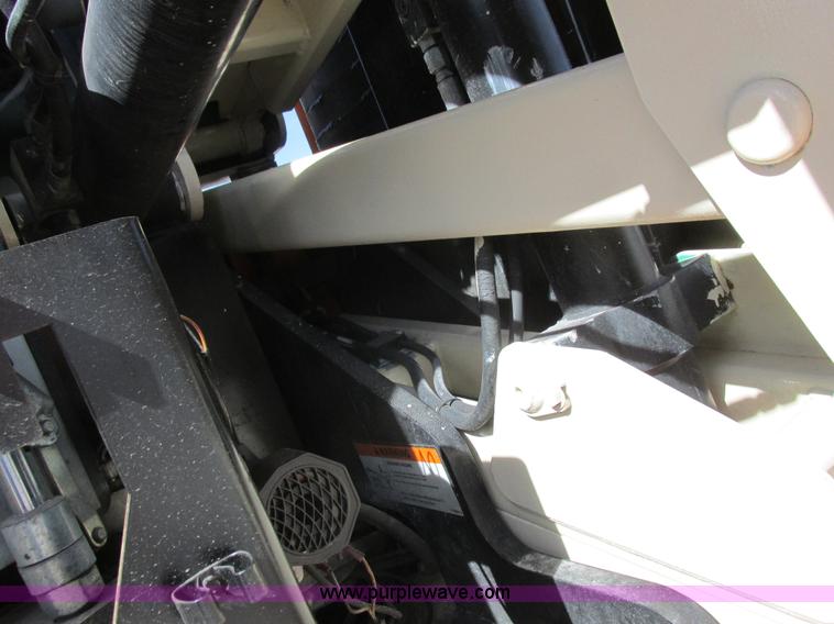 image for item L7151 2006 JLG E300AJP boom lift