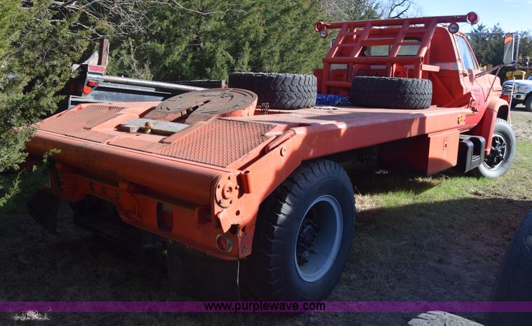 image for item K4310 1975 Chevrolet C65 flatbed winch truck