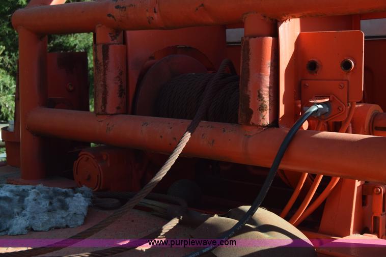 image for item K4310 1975 Chevrolet C65 flatbed winch truck