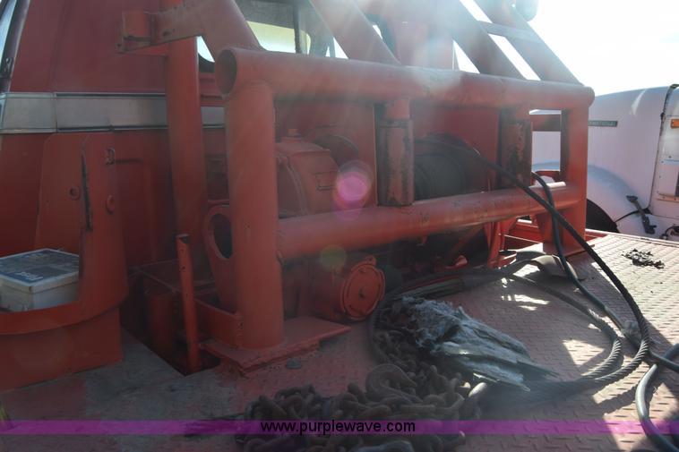 image for item K4310 1975 Chevrolet C65 flatbed winch truck