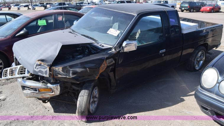 image for item K8519 1995 Nissan KXE pickup truck