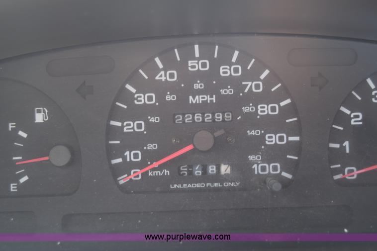 image for item K8519 1995 Nissan KXE pickup truck