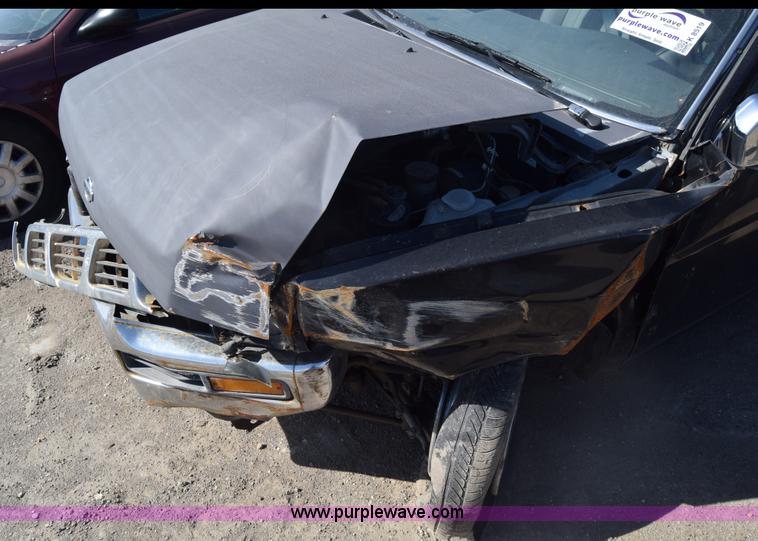 image for item K8519 1995 Nissan KXE pickup truck