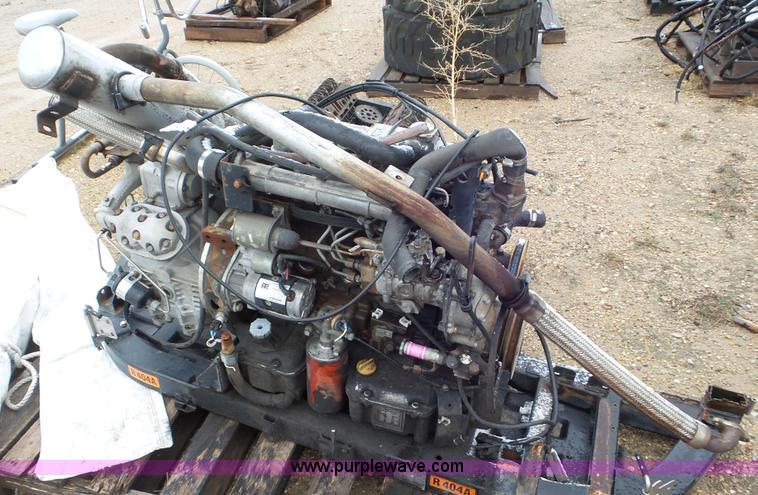 image for item AV9804 1999 Isuzu D201 four cylinder diesel engine