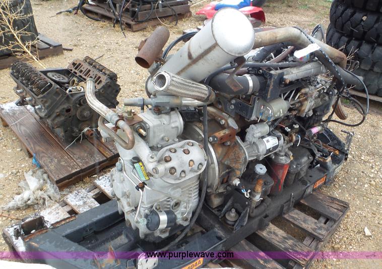 image for item AV9804 1999 Isuzu D201 four cylinder diesel engine