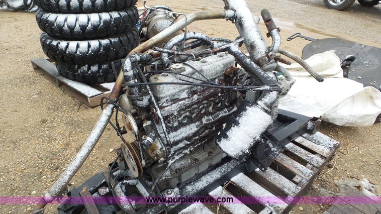 image for item AV9804 1999 Isuzu D201 four cylinder diesel engine