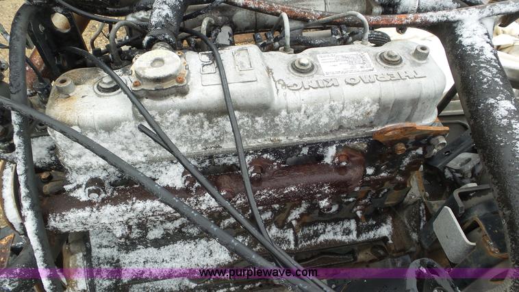 image for item AV9804 1999 Isuzu D201 four cylinder diesel engine