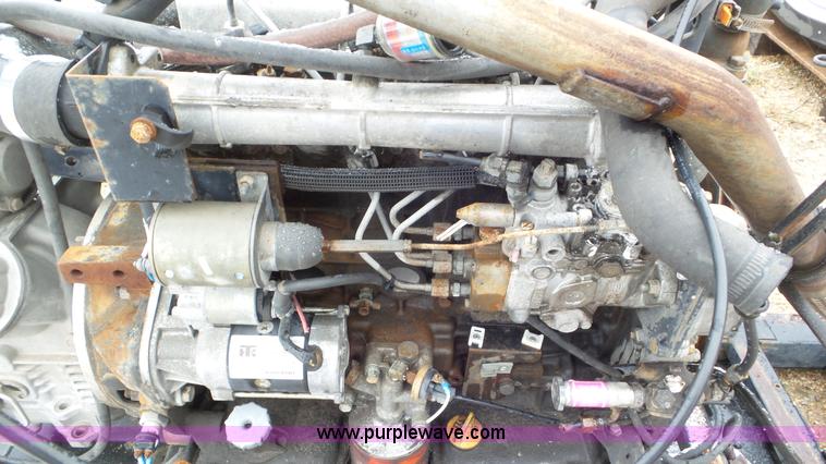 image for item AV9804 1999 Isuzu D201 four cylinder diesel engine