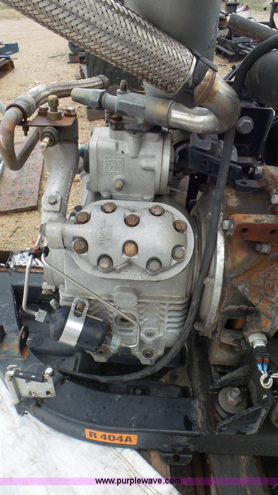 image for item AV9804 1999 Isuzu D201 four cylinder diesel engine