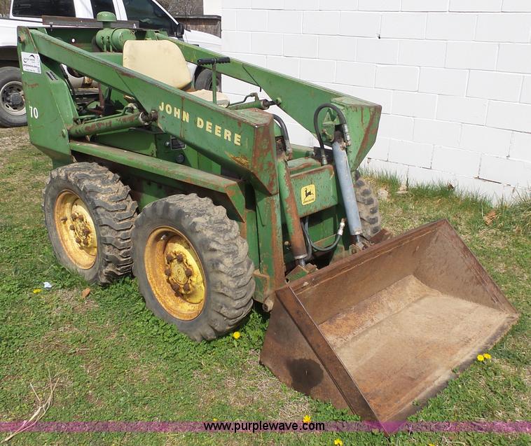 image for item J4174 John Deere 70 skid steer