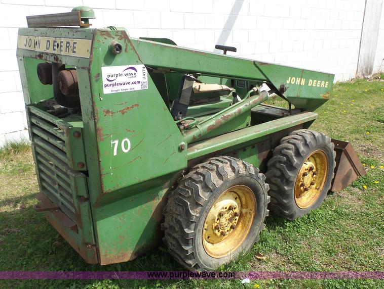 image for item J4174 John Deere 70 skid steer