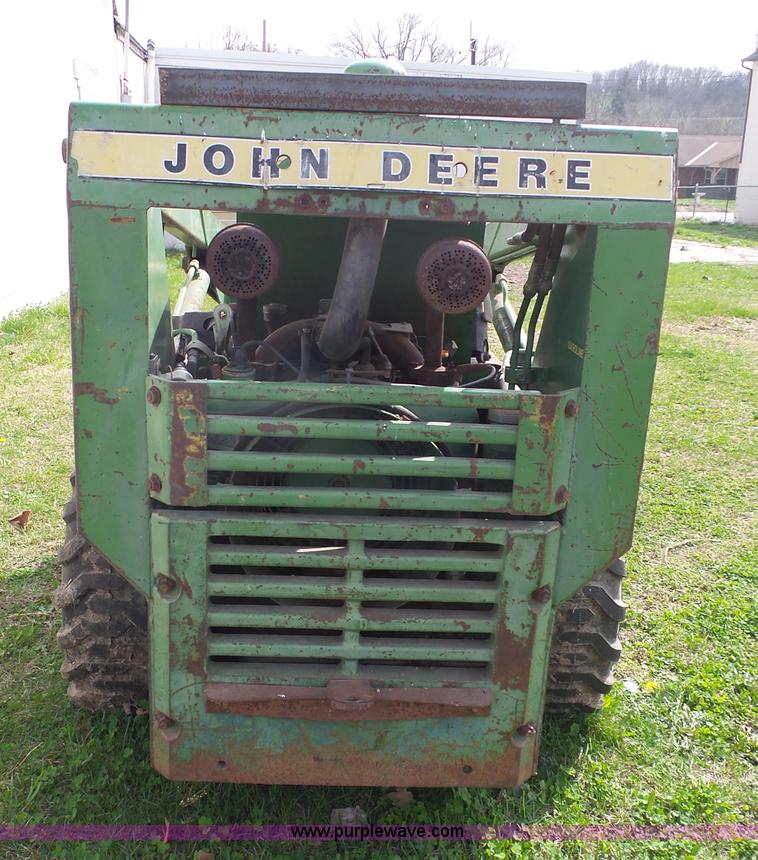 image for item J4174 John Deere 70 skid steer