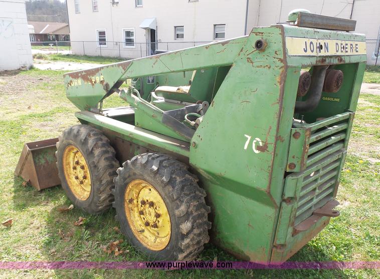 image for item J4174 John Deere 70 skid steer