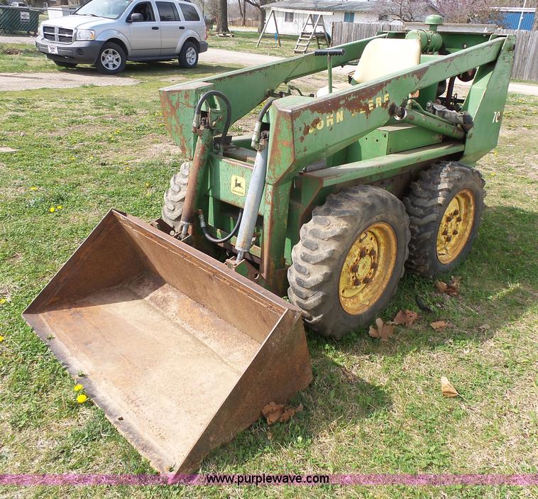image for item J4174 John Deere 70 skid steer
