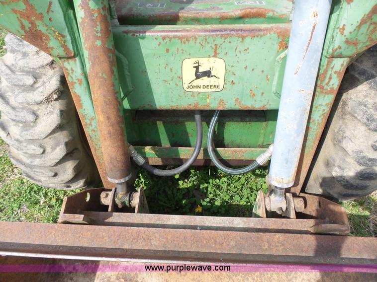 image for item J4174 John Deere 70 skid steer