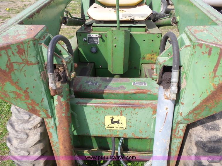 image for item J4174 John Deere 70 skid steer
