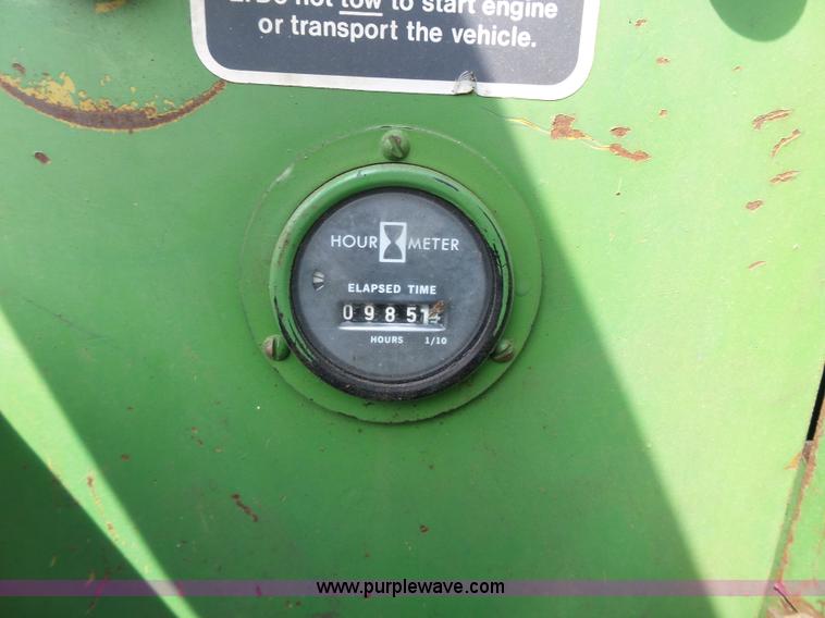 image for item J4174 John Deere 70 skid steer